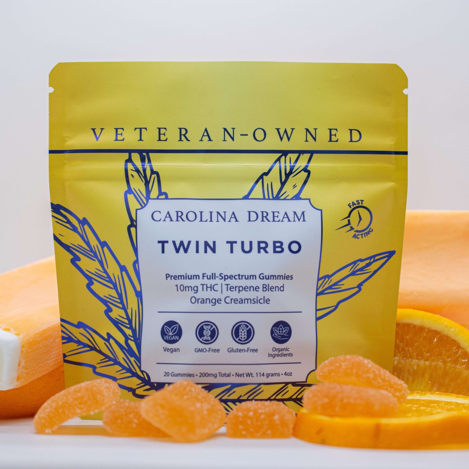 Yellow package labeled 'Carolina Dream Twin Turbo' with orange gummies and popsicle on a white background