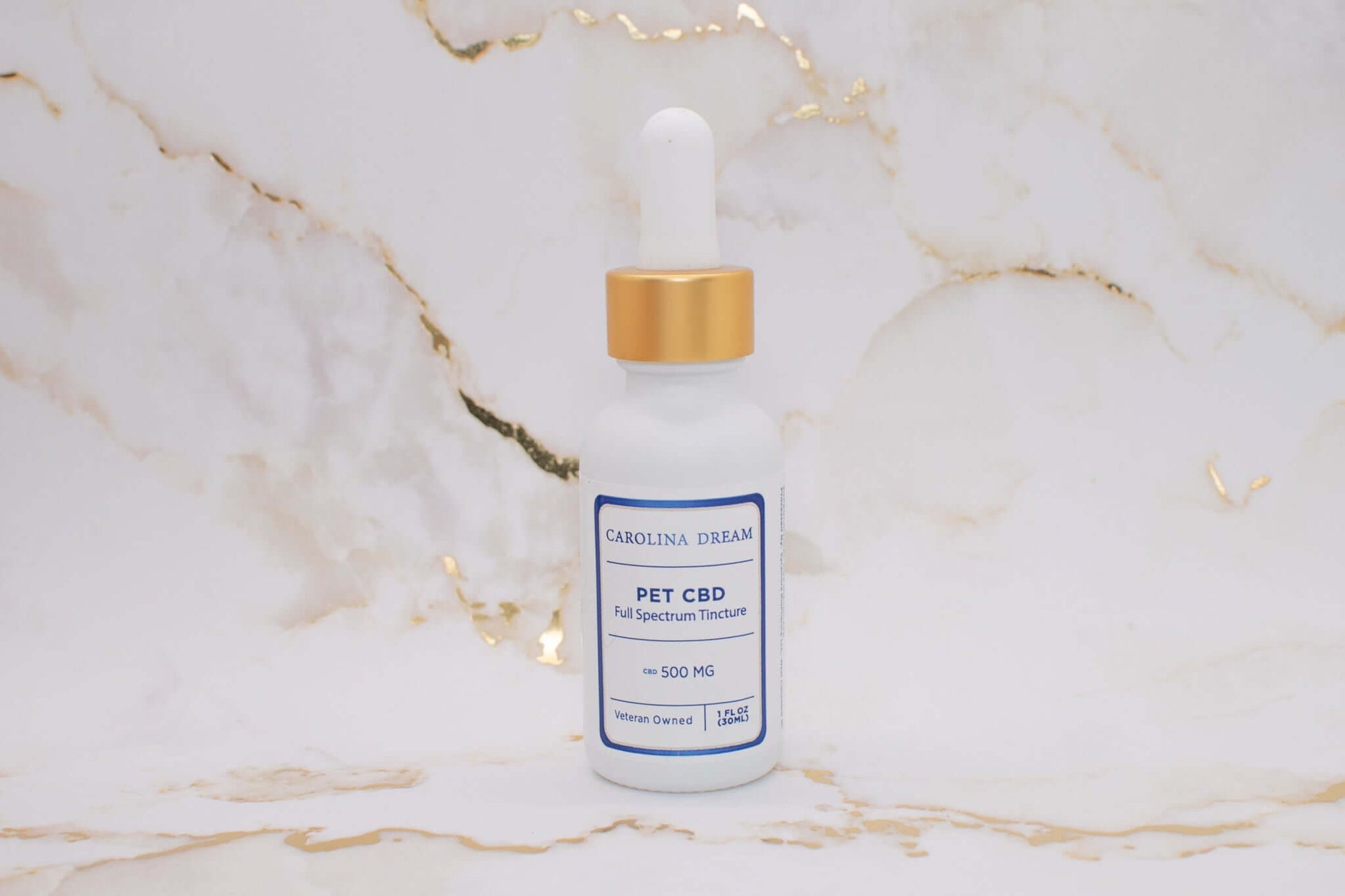 500mg Pet CBD Tincture from Carolina Dream in a white bottle with dropper, crafted for pet relaxation and comfort.